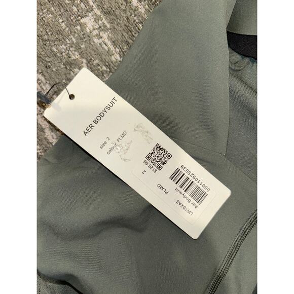 NWT Lululemon Aer Bodysuit *lululemon lab
Palm Deco Sz 2 - Picture 10 of 10